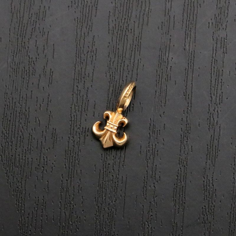 image of Chrome Hearts Bs Flare Stack Charm in Yellow Gold, Men's