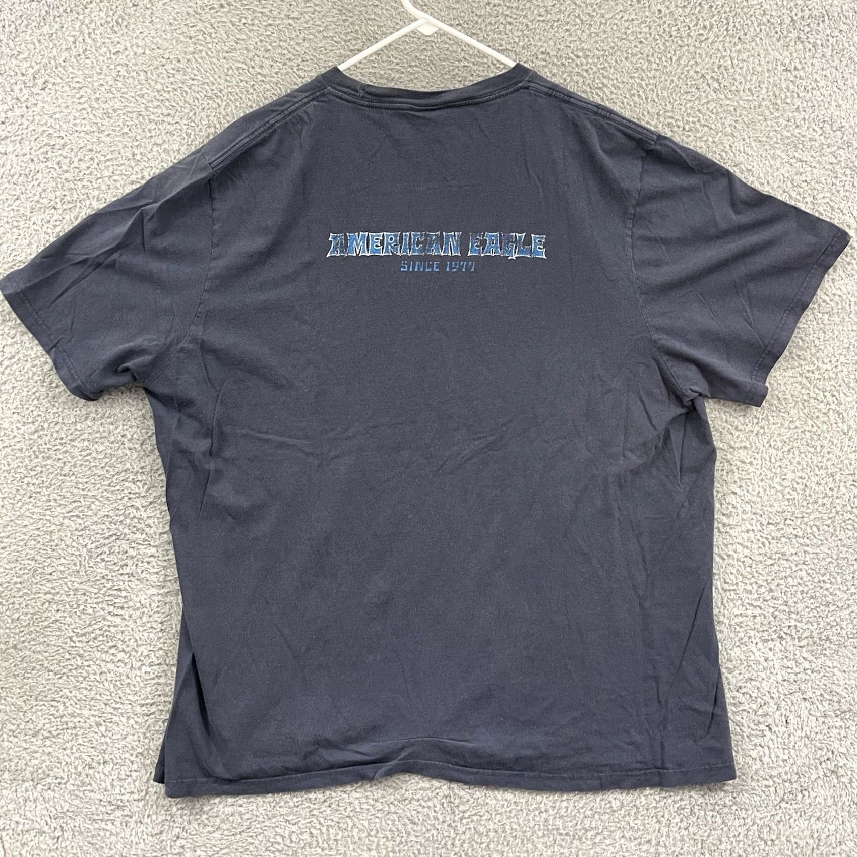 American Eagle Outfitters VINTAGE Mojos Blues Palace T-Shirt Adult 2XL Blue Graphic Tee Shirt Regular Mens Blue 2000s USA Graphic Print Cotton Skull Adventure Time Angel Bike Size US XXL / EU 58 / 5 - 5 Thumbnail