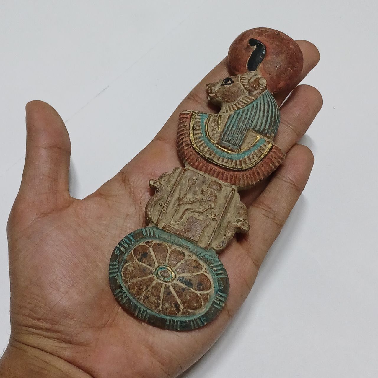 Handcrafted Egyptian figure with intricate patterns
