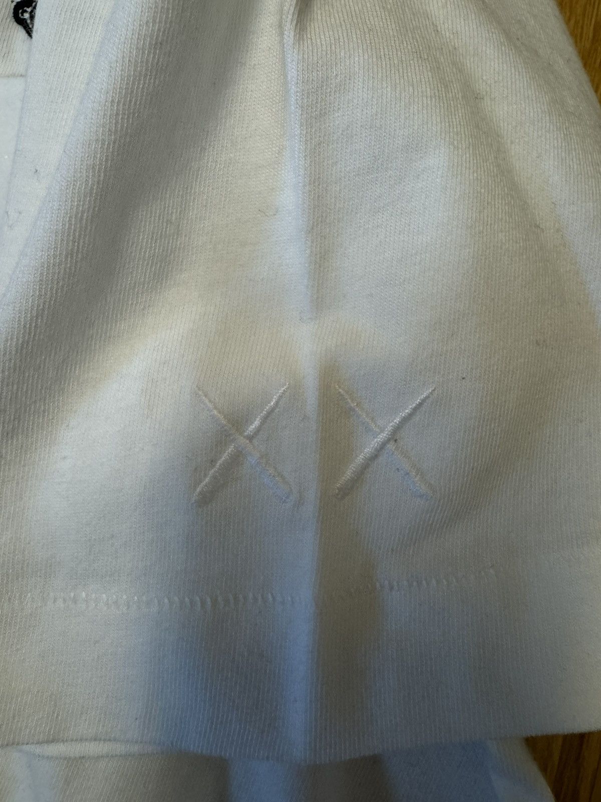 Kaws × Peanuts × Uniqlo Kaws x Uniqlo x Peanuts Snoopy Pocket Tee Size US M / EU 48-50 / 2 - 6 Thumbnail