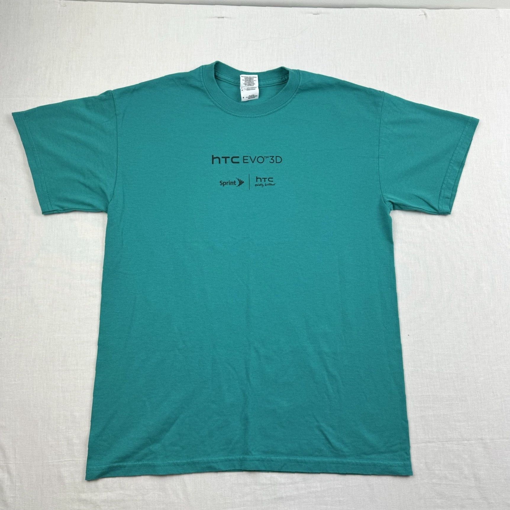 Gildan HTC Evo 3D Cell Phone Promotional Shirt Adult Medium Teal Green Hornet 2011 Model Size US M / EU 48-50 / 2 - 2 Thumbnail