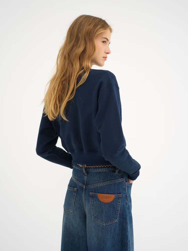 o1loc1c11125 Mockneck Logo Sweater in Blue