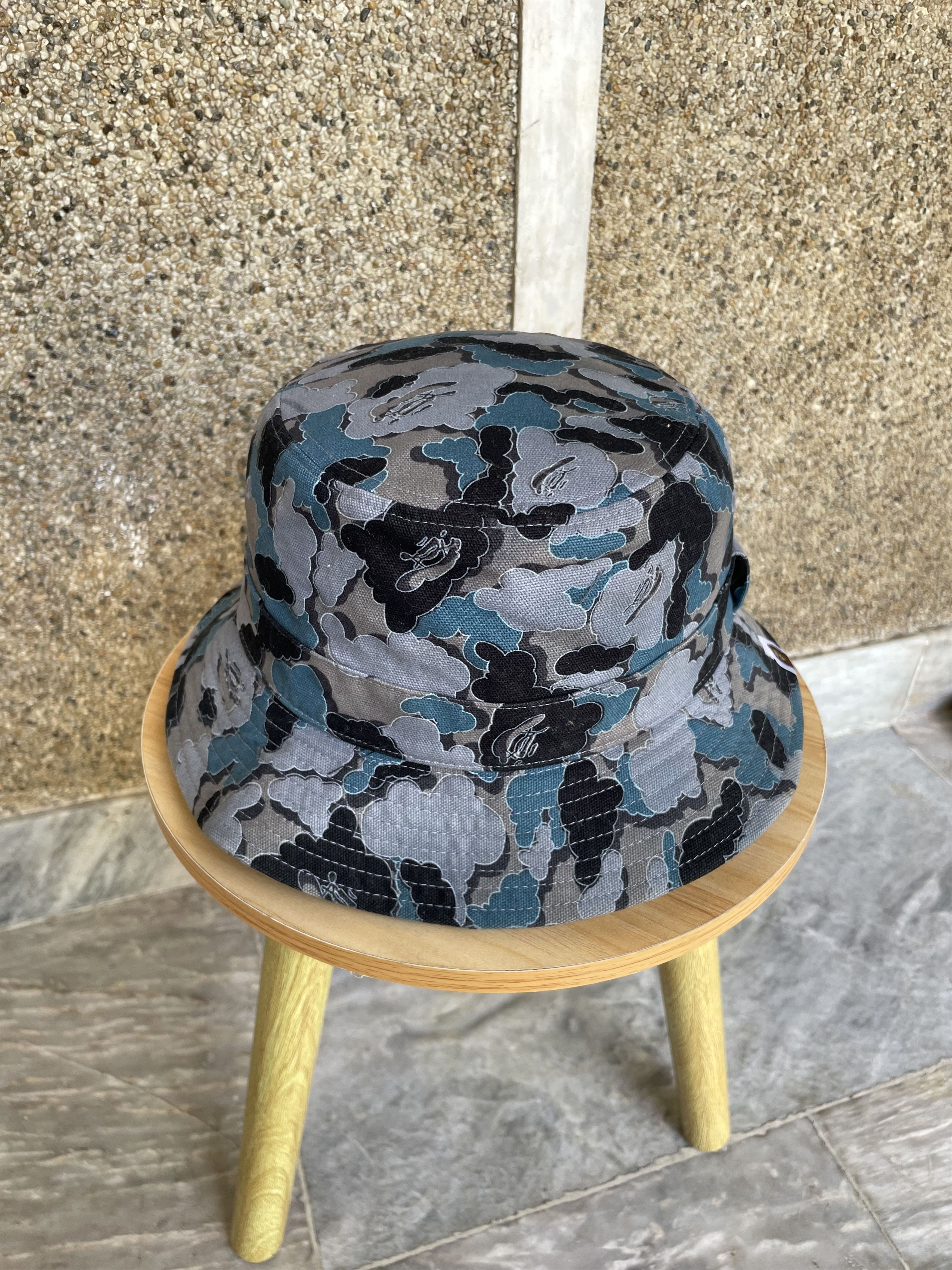 Bape × Kaws Bape x Kaws Cloud Camo Bucket Hat Size ONE SIZE - 1 Thumbnail