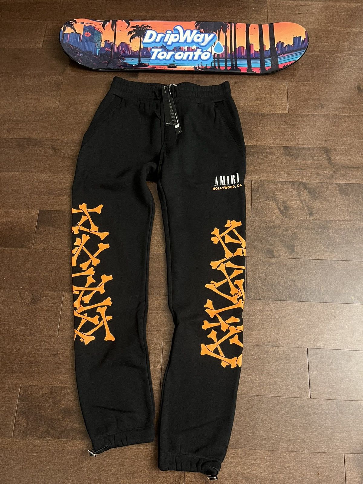 image of Amiri Bones Sweatpants in Black, Men's (Size 31)