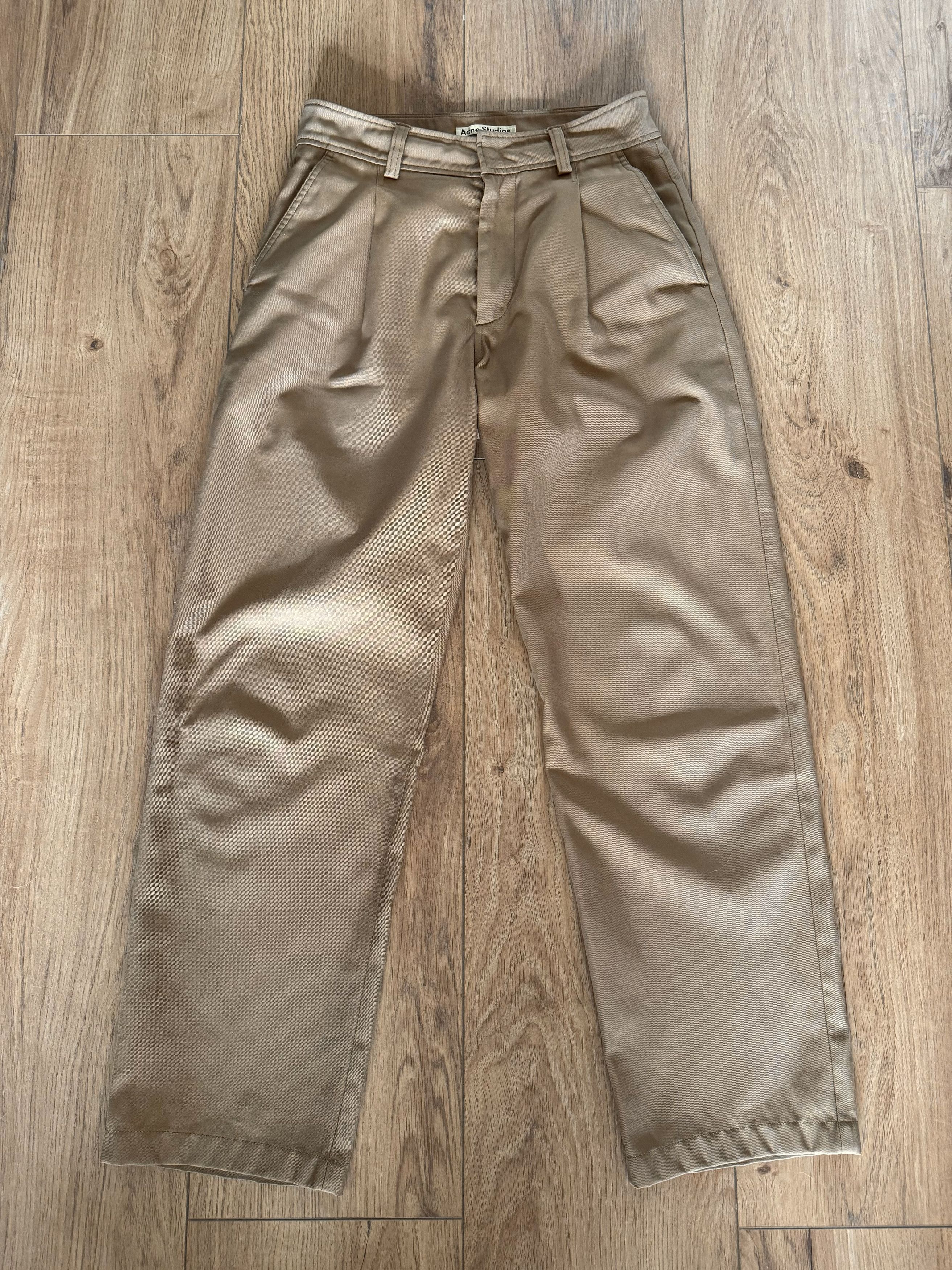 image of Acne Studios Nylon Pleated Trousers in Beige, Men's (Size 28)