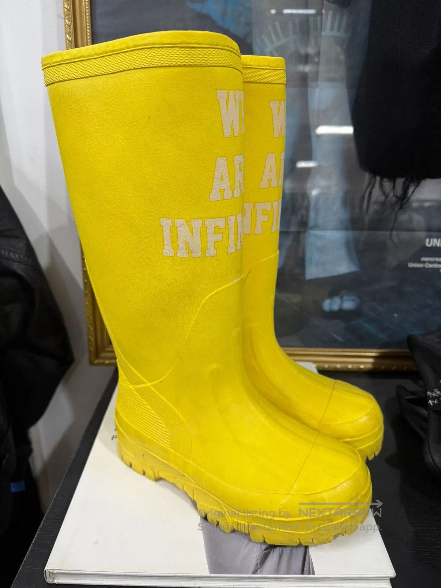 undercover we are infinite rain boots.