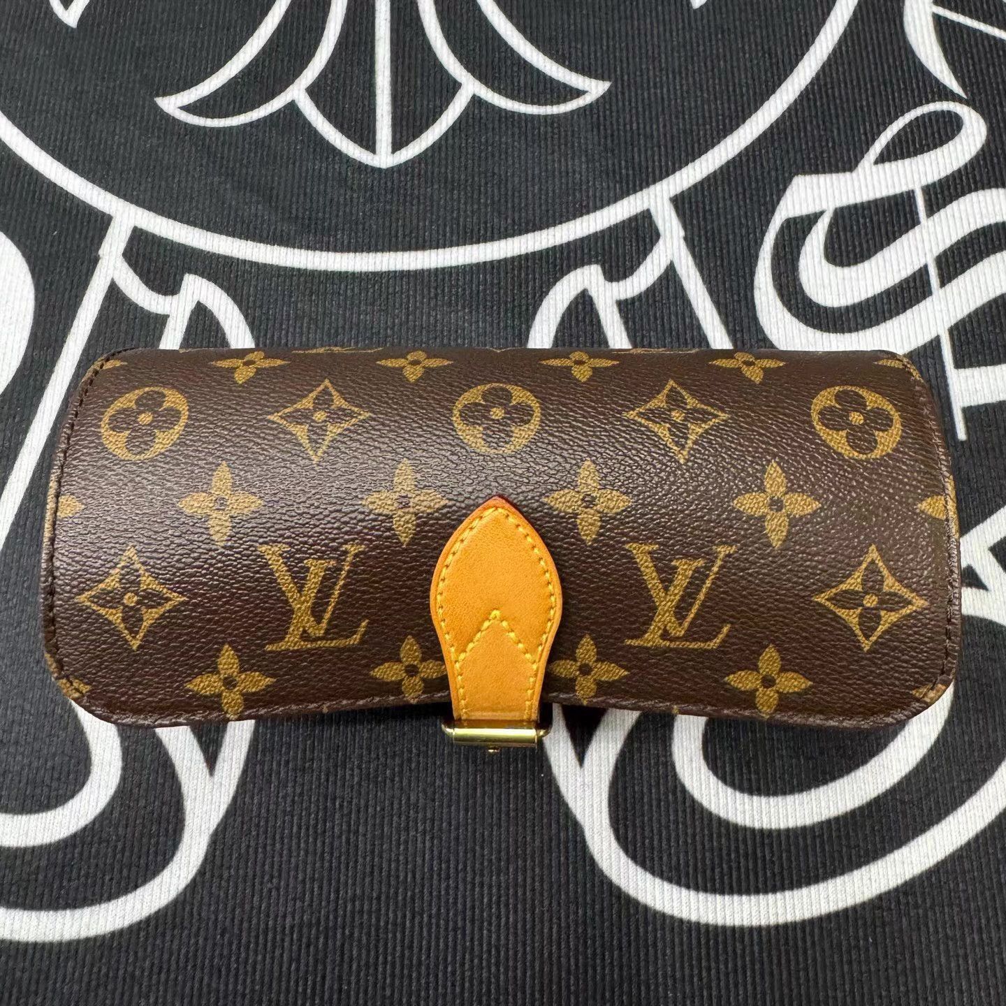 Louis Vuitton Multi-Pattern Leather Wallet with Buckle Closure Size ONE SIZE - 1 Thumbnail