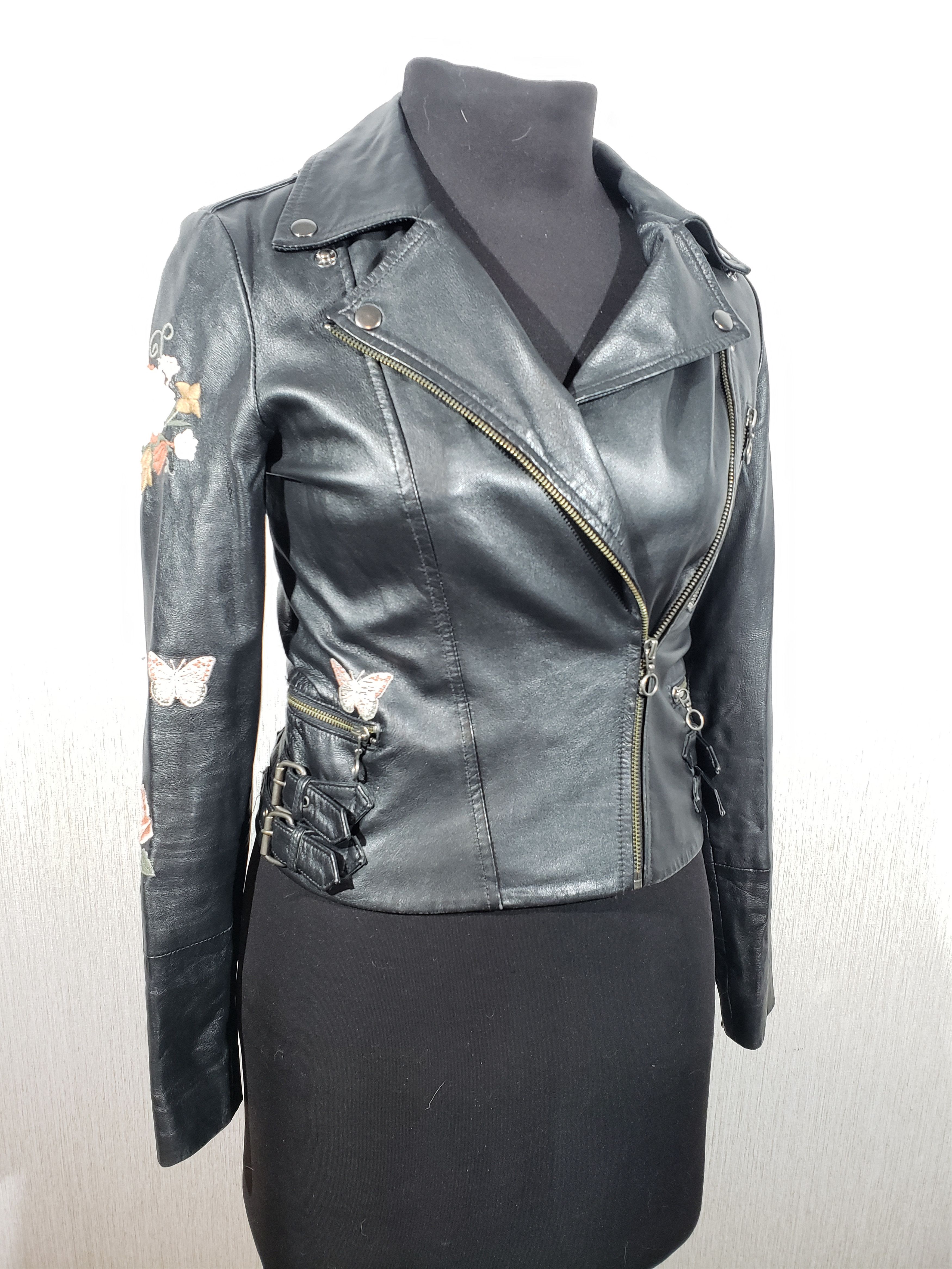 Cute women's leather jacket with colorful embroidery.