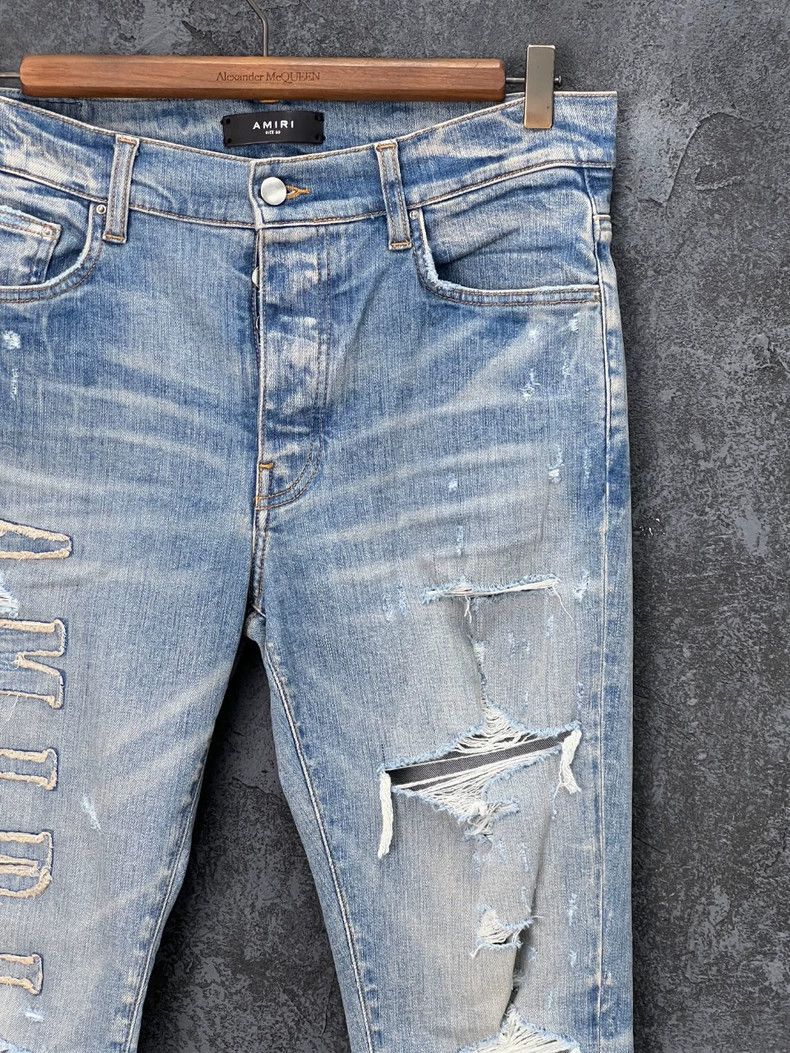 Amiri Amiri Embroidered logo distressed denim pants Size US 33 - 3 Thumbnail