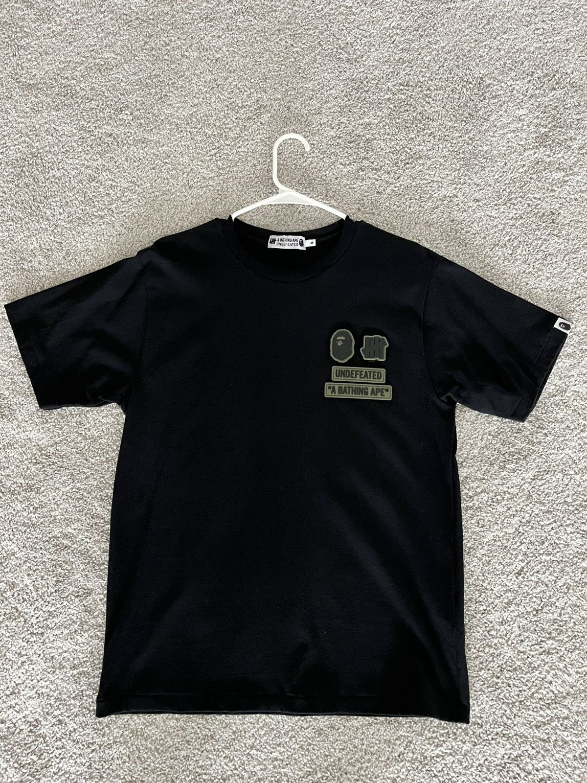 人気話題コラボ！Bape x Undefeated 5 Strikes Tee Black Bape × Undefeated Bape x Undefeated Patch Tee | Grailed