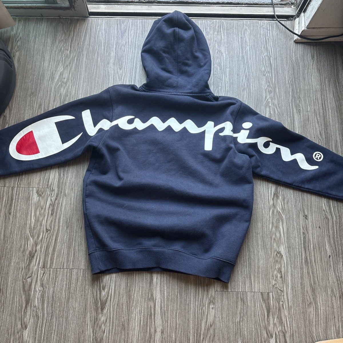 Champion × Supreme Navy blue supreme champion label hoodie | Grailed