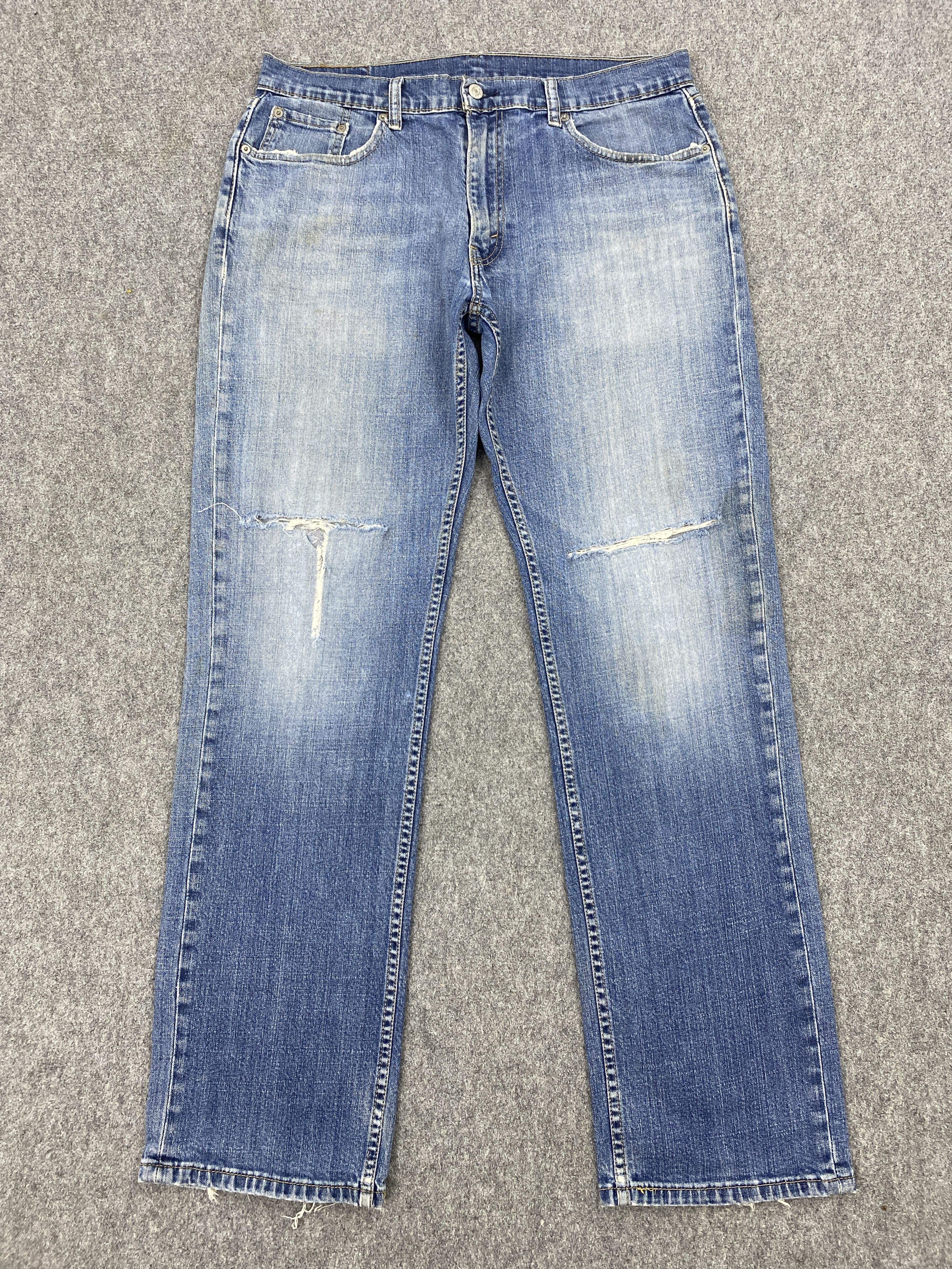 image of Faded Blue Vintage Levis 559 Denim Jeans in Blue Denim, Men's (Size 35)
