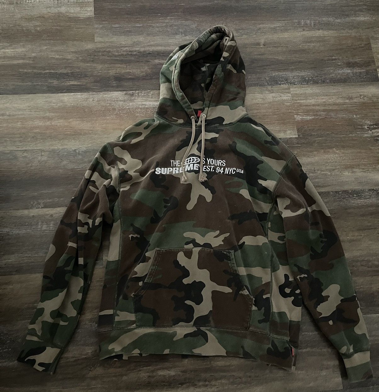 image of Supreme The World Is Yours Hooded Sweatshirt in Camo, Men's (Size XL)