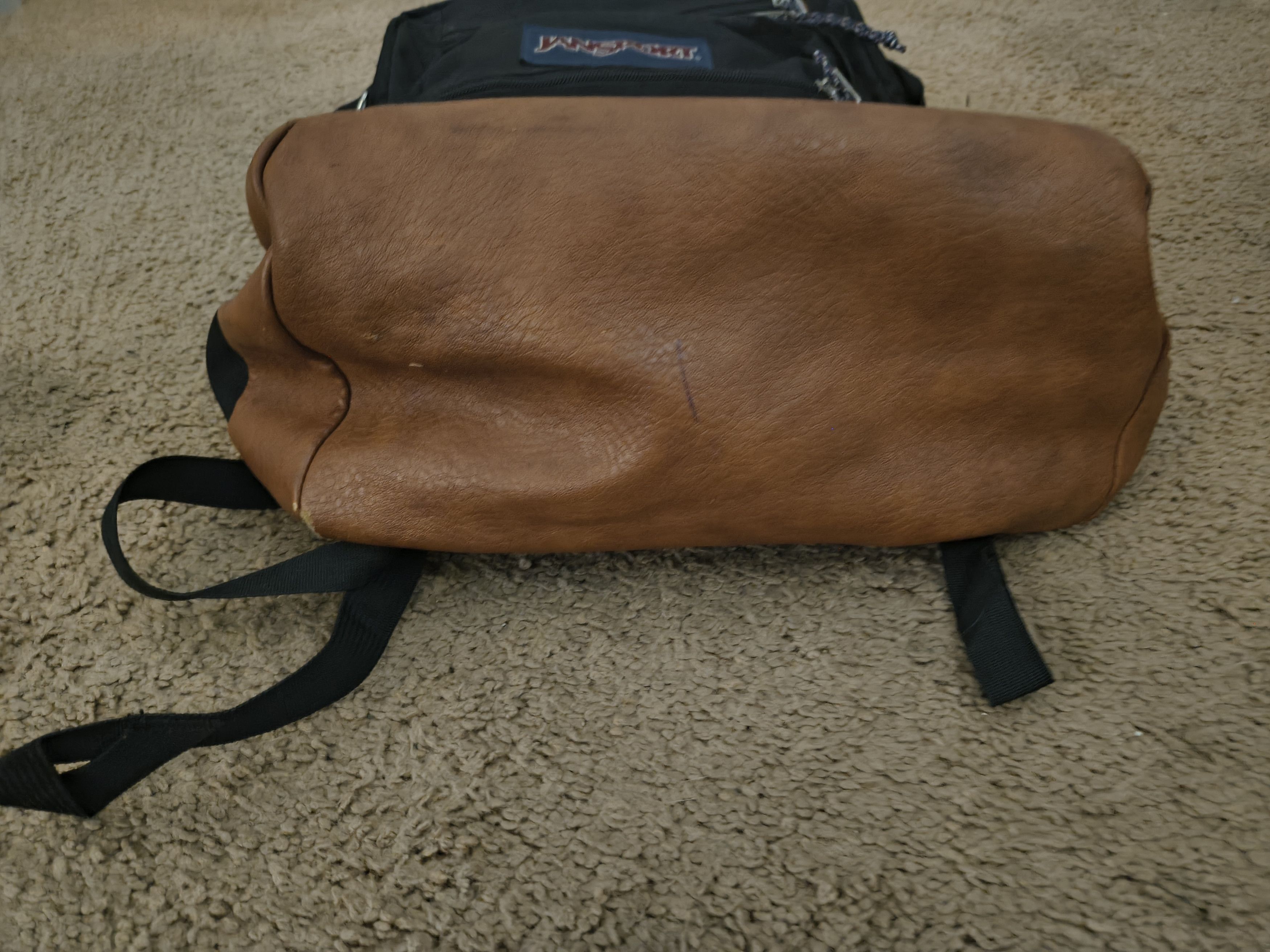 Jansport Black JanSport backpack W/ eather bottom like new condition Size ONE SIZE - 2 Thumbnail