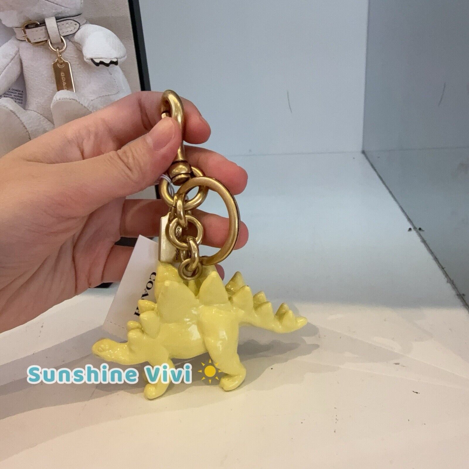 Coach NWT Coach CAX77 Keychain Stegosaurus Bag Charm Brass/Yellow Size ONE SIZE - 3 Thumbnail