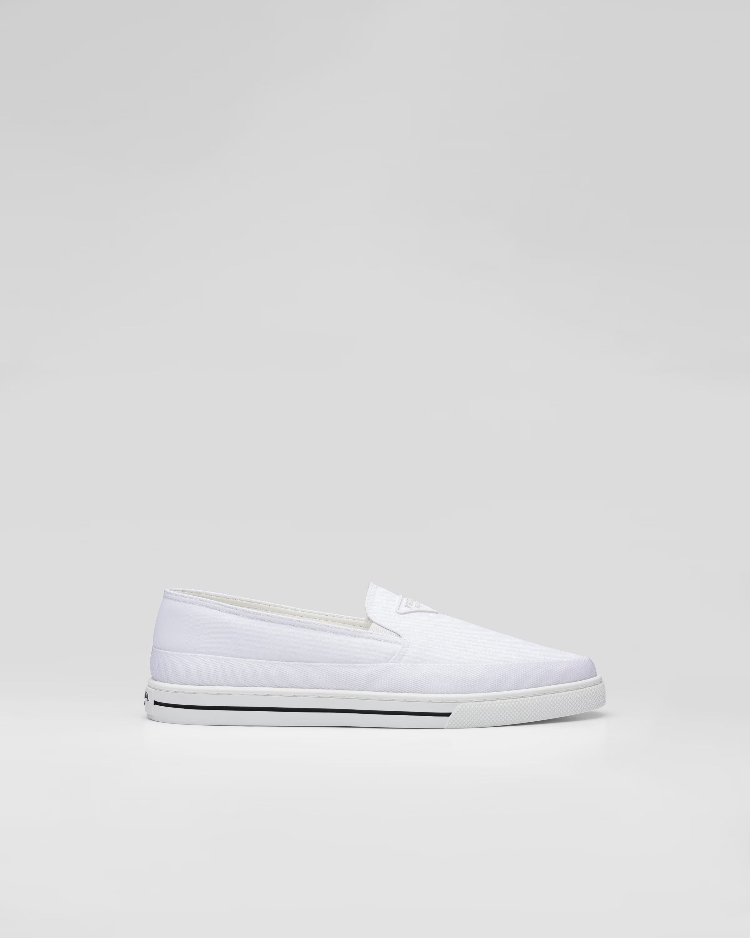 Prada o1srvl11e0226 Re-Nylon Slip-On Sneakers in White Size US 10 / EU 43 - 1 Thumbnail