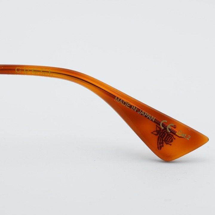 Gucci Gucci GG0113S 001 Sunglasses Black Gold Round Frame, Grey Size ONE SIZE - 8 Thumbnail