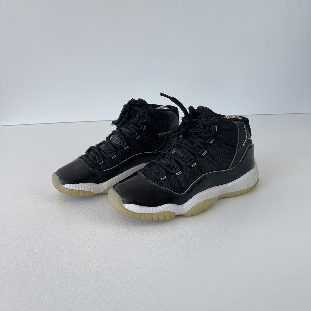 Jordan Brand Nike Air Jordan 11 Retro Jubilee GS 20 Hi-Top Shoes Black Size US 6 / IT 36 - 1 Thumbnail