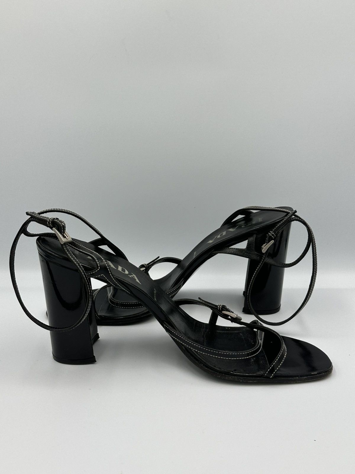 Prada heeled sandals crafted from black leather