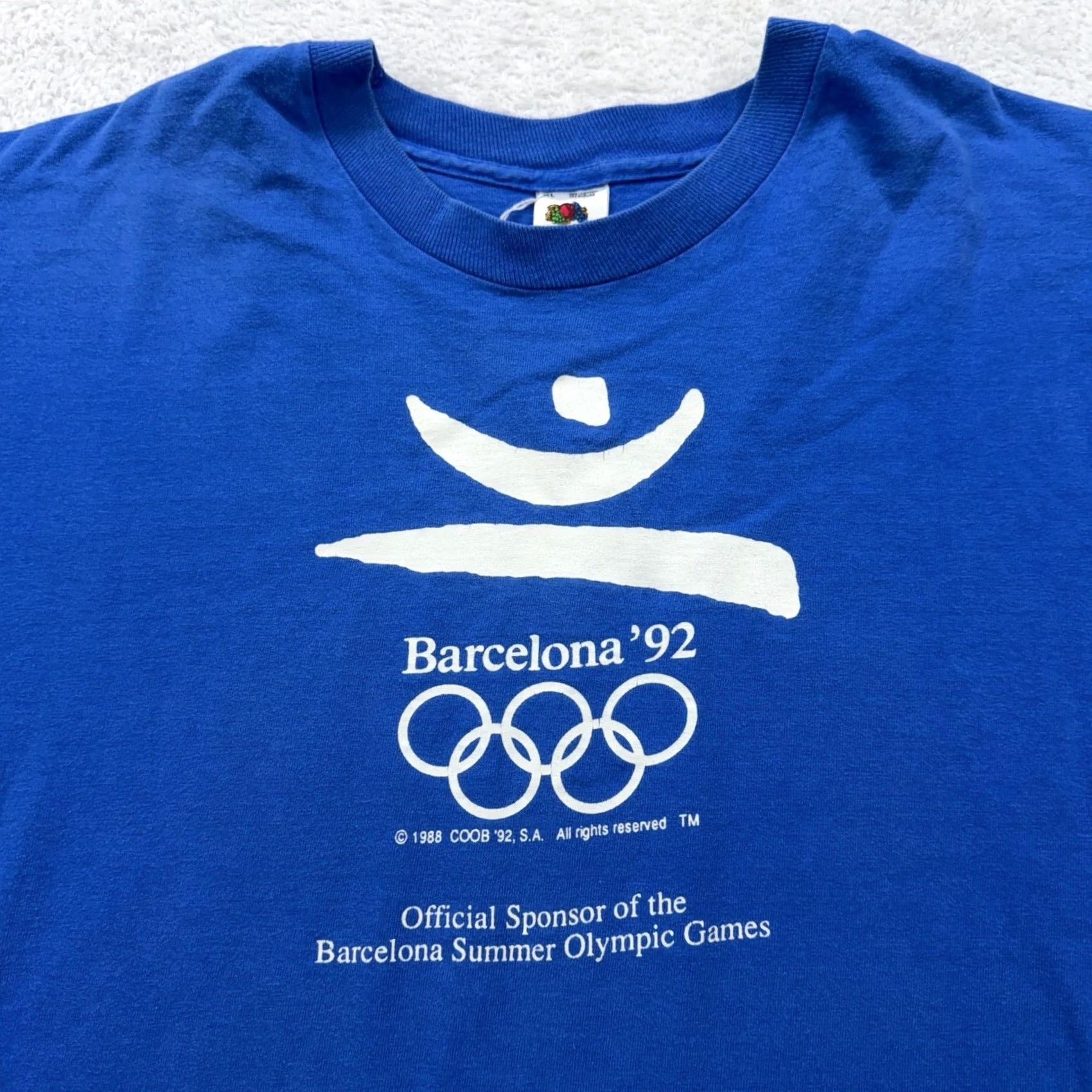 Fruit Of The Loom VINTAGE Fruit of the Loom Barcelona 92 Olympic Games T Shirt Official Sponsor Blue XL Shirt Men XS? Size US XL / EU 56 / 4 - 2 Thumbnail