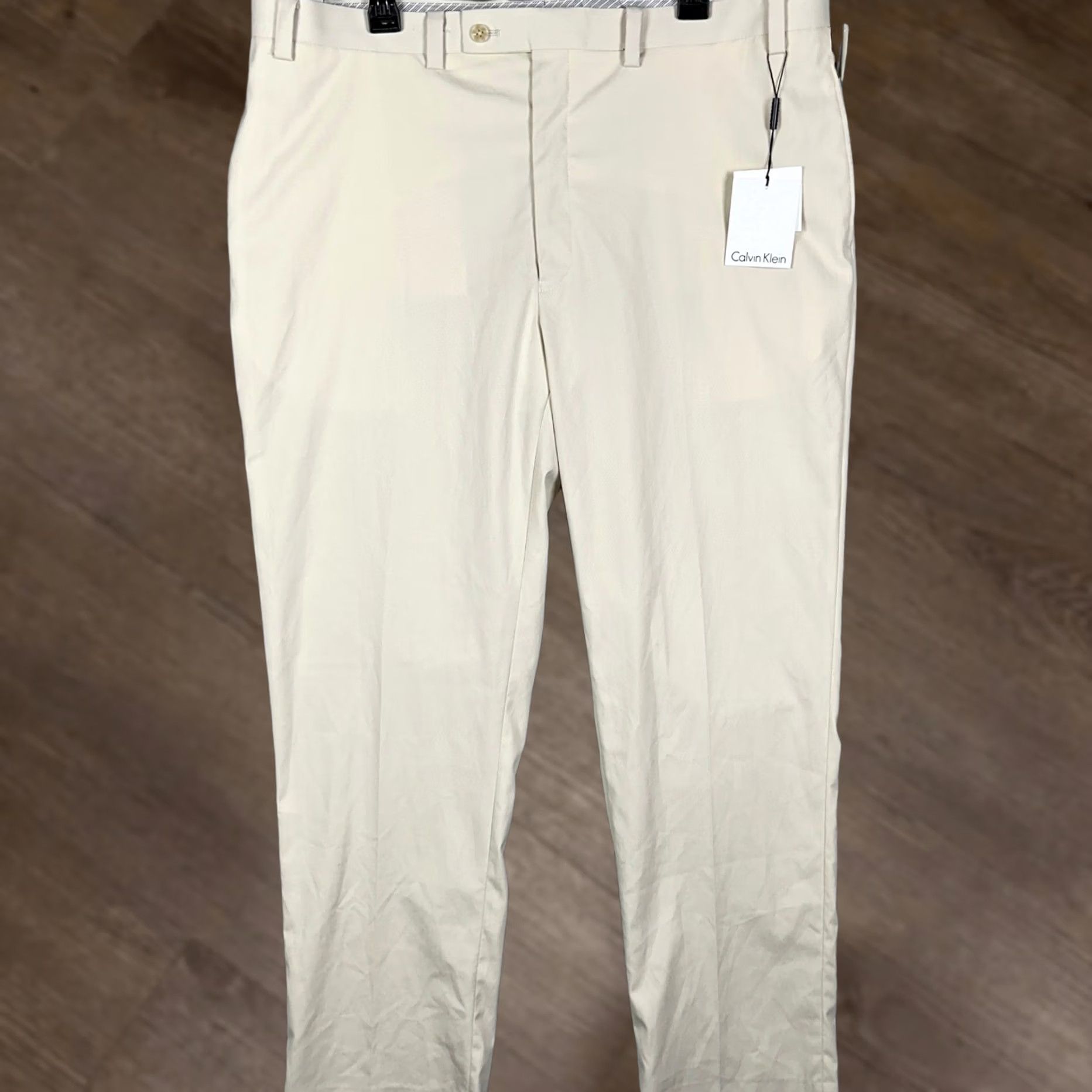 Calvin Klein Calvin Klein Pants Mens 40X32 Ivory Dress Pants Flat Front Stretch Straight Leg Business Formal Women? Mens Size US 40 / EU 56 - 1 Thumbnail