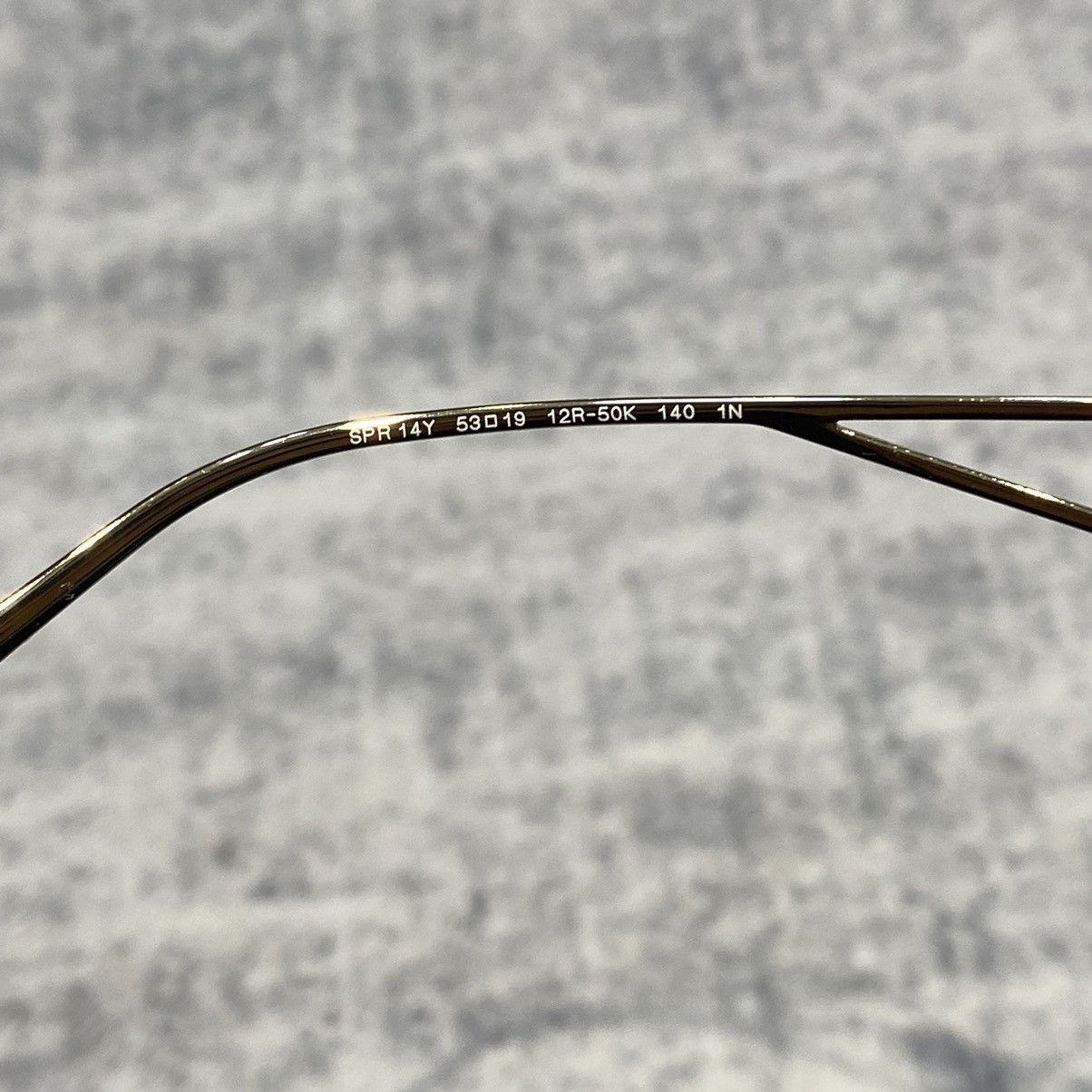 PRADA 0PR 14YS 12R50K TRANSPARENT GREY