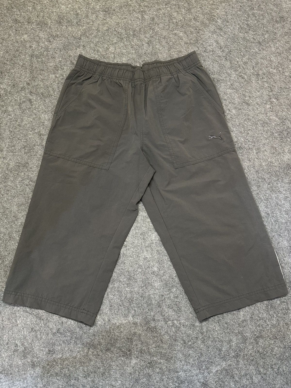 Puma PUMA dark grey track pants with a 3/4 length. Size US 30 / EU 46 - 1 Thumbnail
