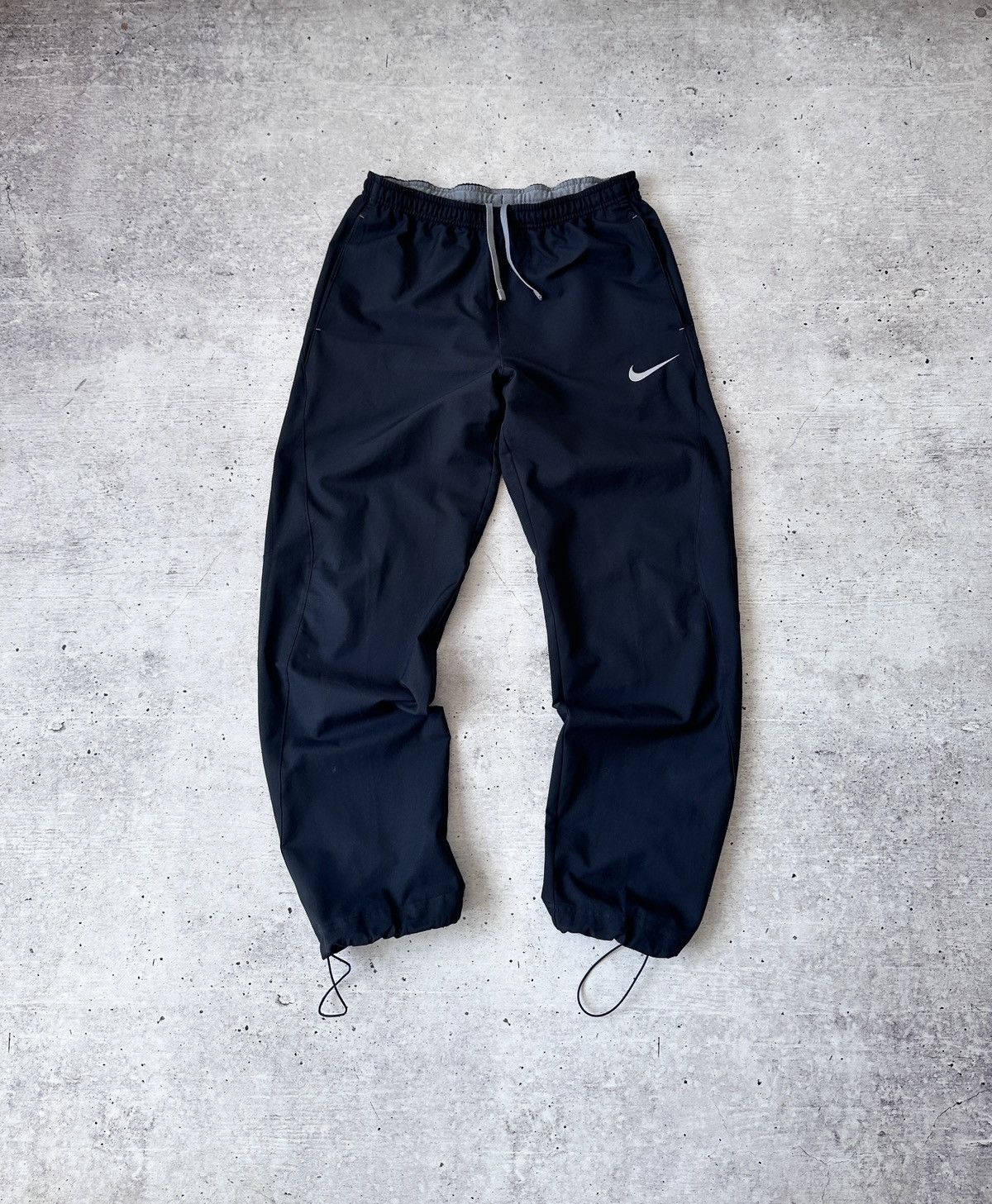 Nike Nike Cargo Style Windpants Drawstring Ankle Hem Warm Up Pant Size US 32 / EU 48 - 1 Thumbnail