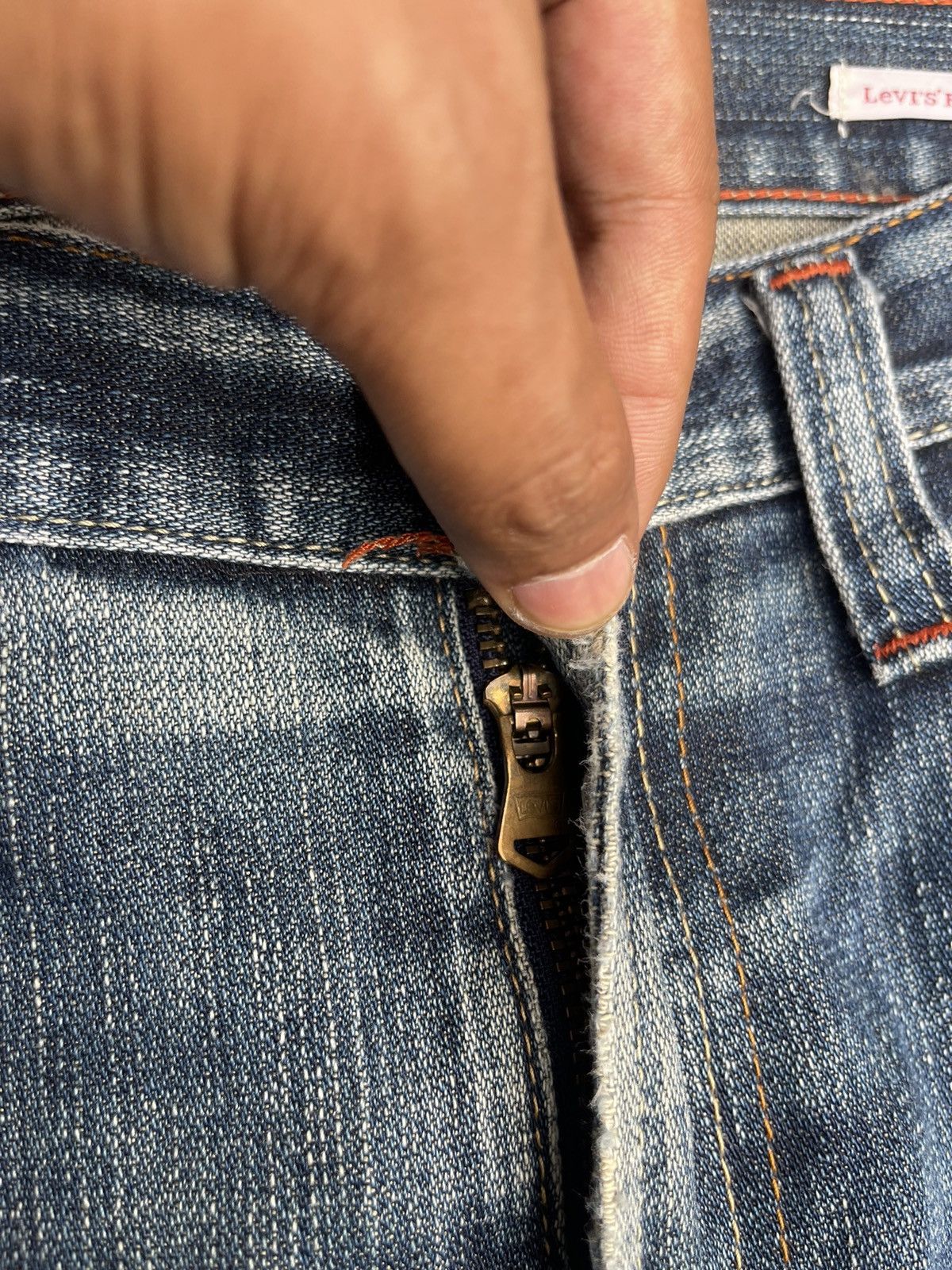 Levis 505 Distressed Faded Denim Jeans