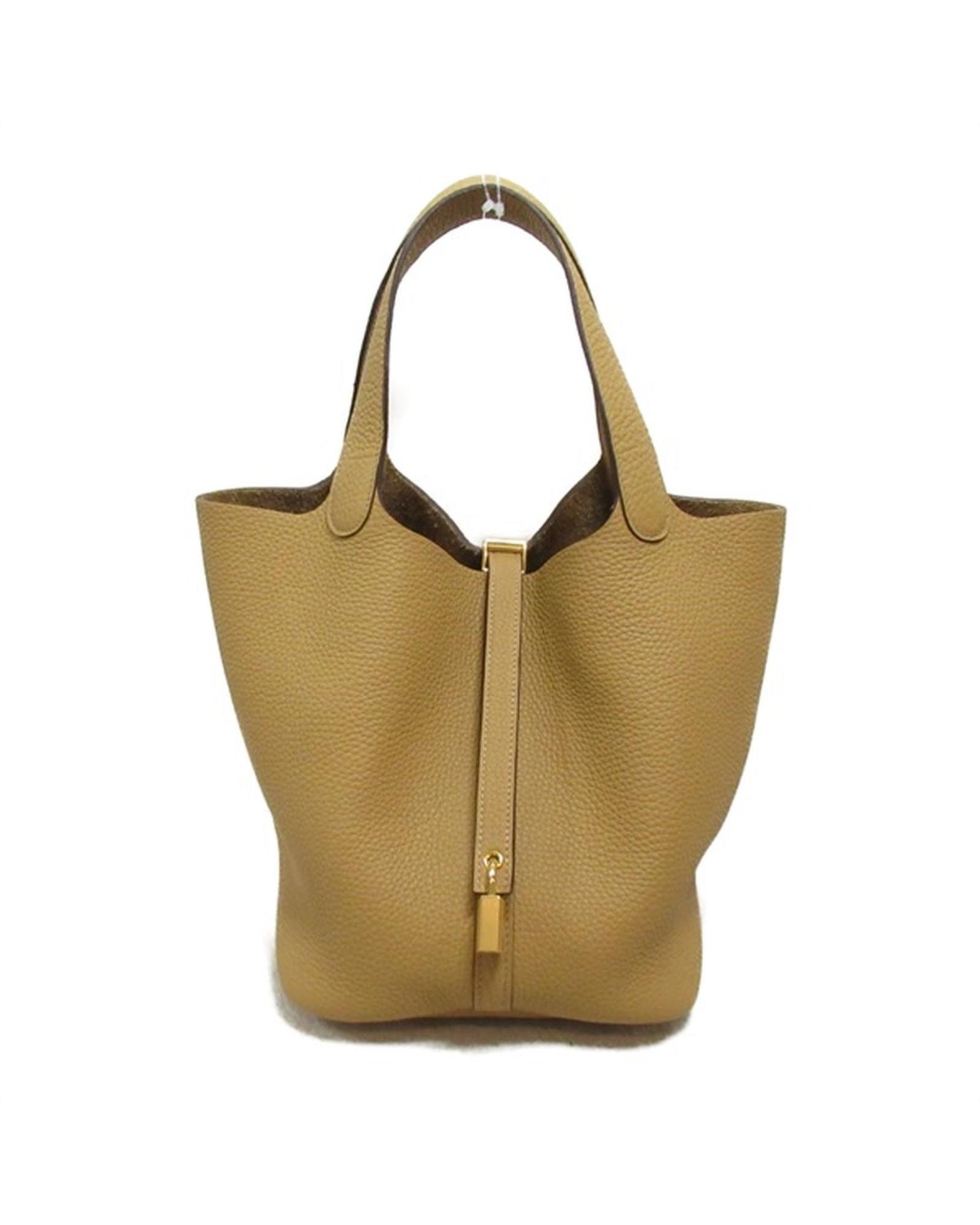 image of Brown Leather Tote Bag With Lock Closure By Hermes, Women's