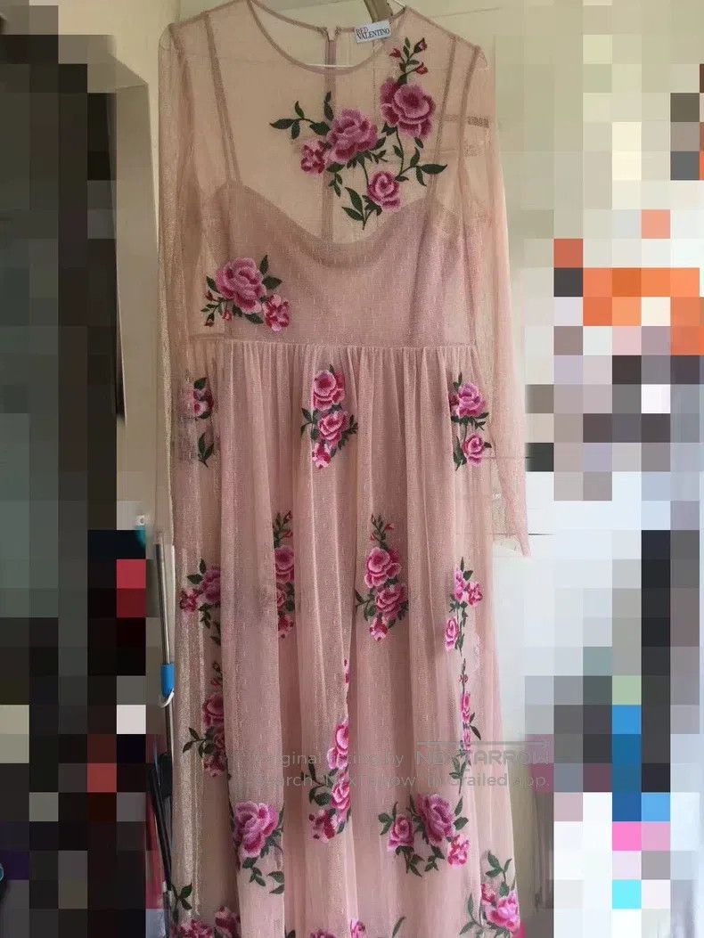 Valentino The nude pink gauze skirt is reworked and embroi