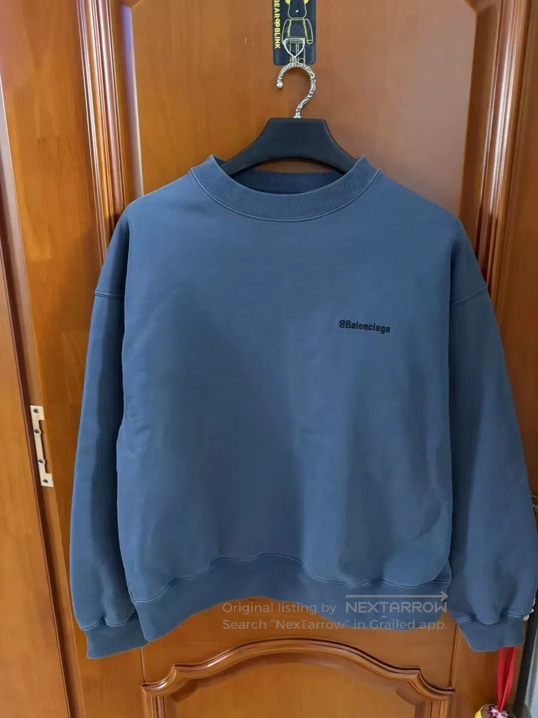 balenciaga dark blue embroidered logo sweatshirt.