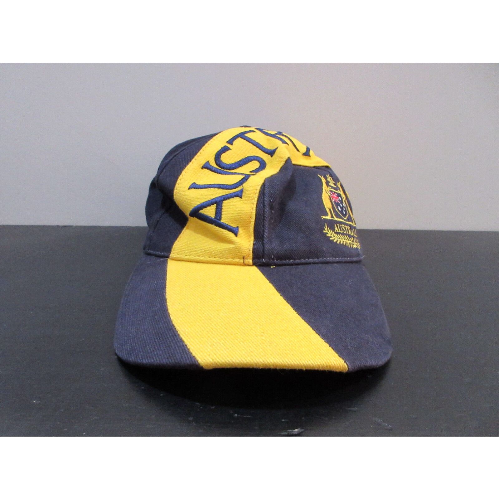 image of Vintage Australia Hat Cap Strap Back Blue Yellow Spell Out Logo Swirl Mens 90's in White