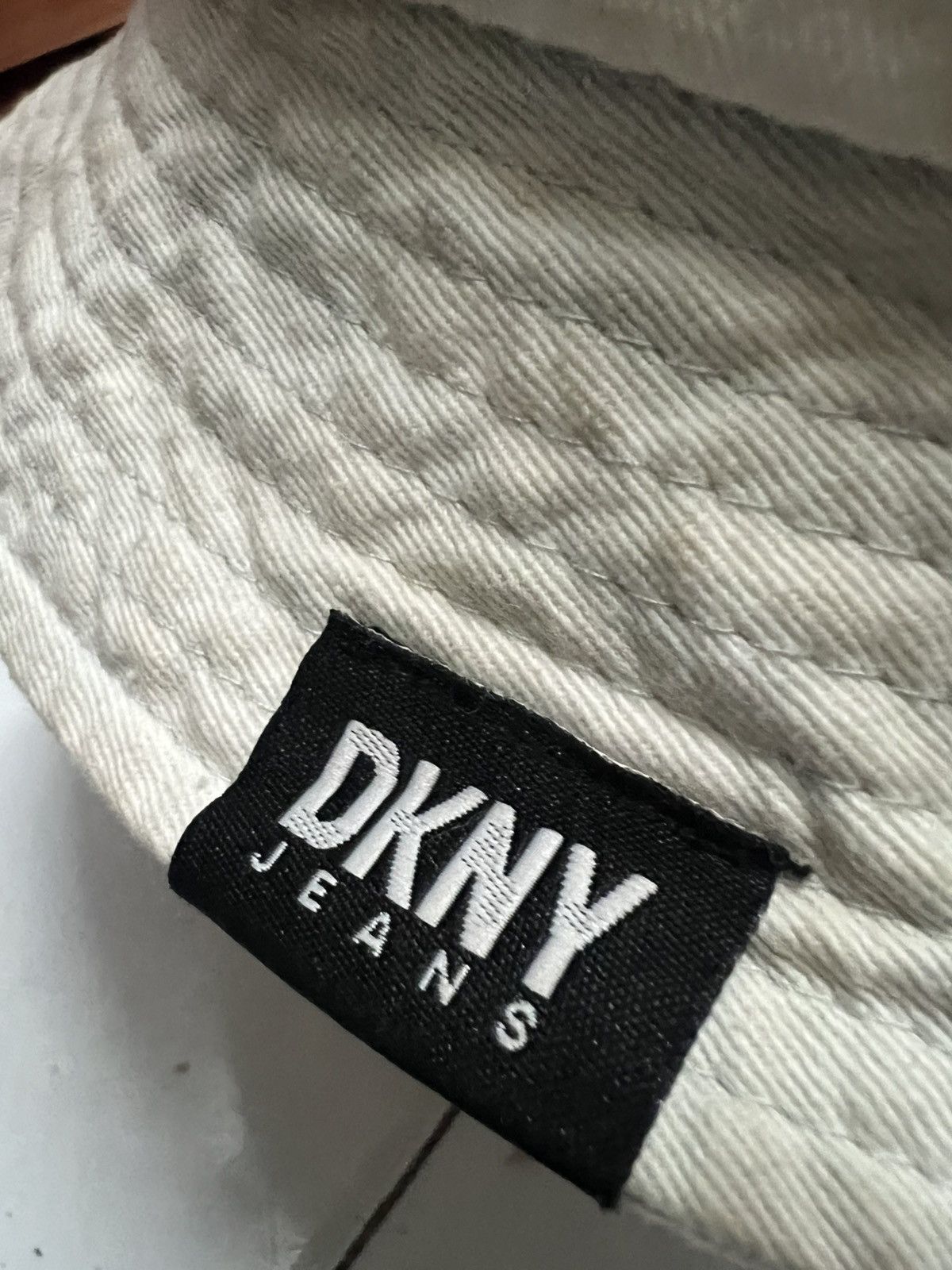 DKNY hats men spellout