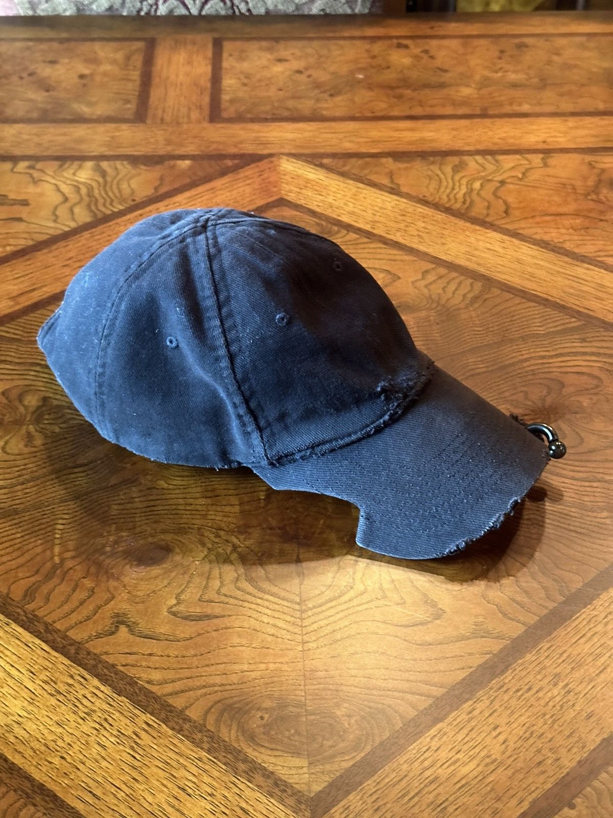 image of Balenciaga Piercing Cap in Black, Men's