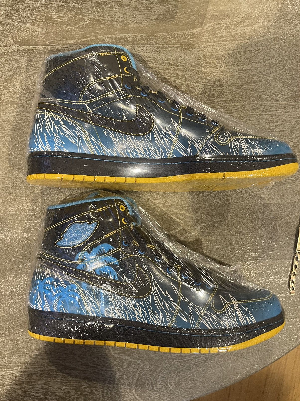 image of Jordan Nike Air Jordan 1 Retro High Doernbecher Mr Boober Deadstock Shoes in Blue, Men's (Size 10)