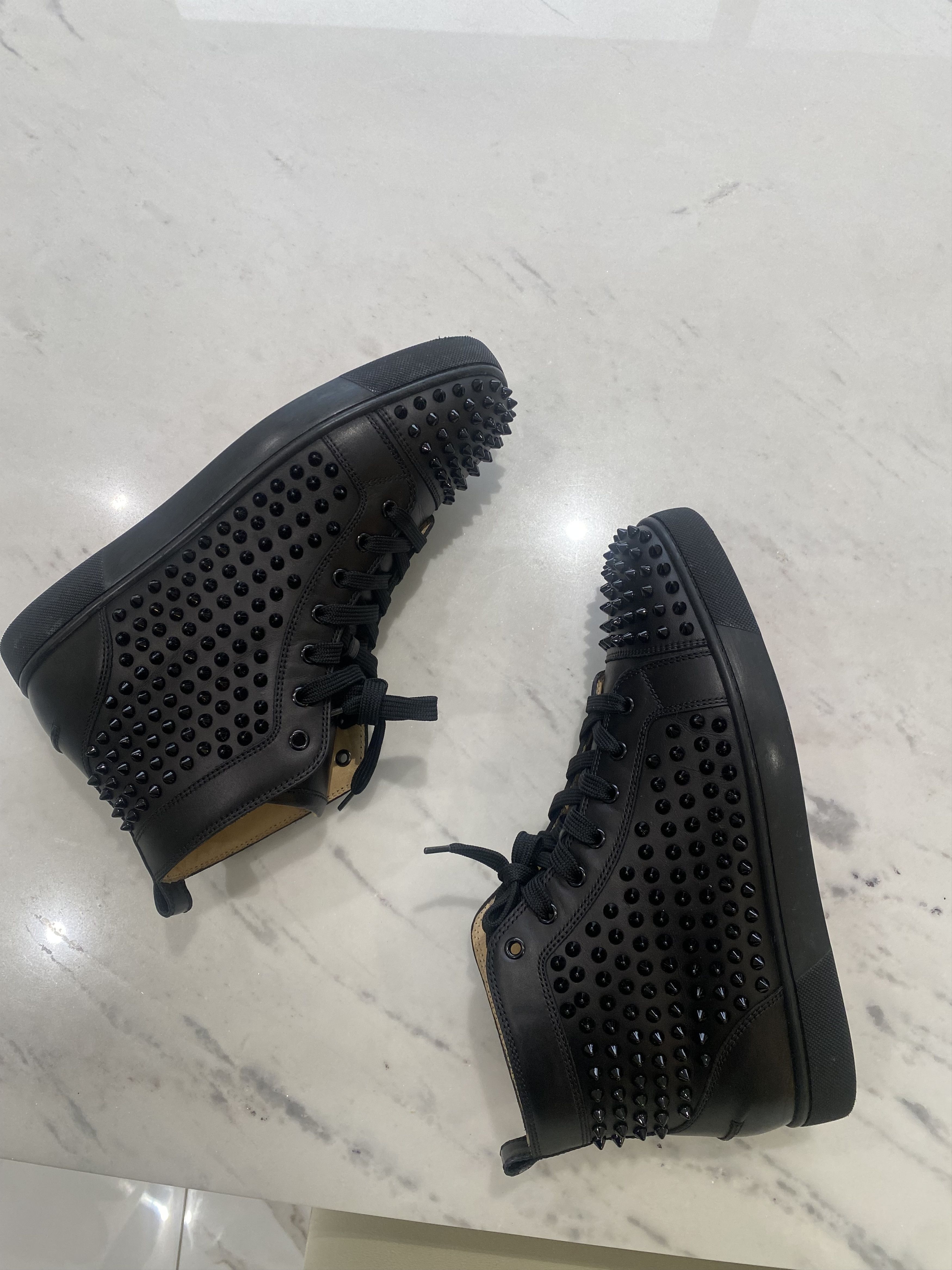 Christian Louboutin Calf leather and spikes Sneakers