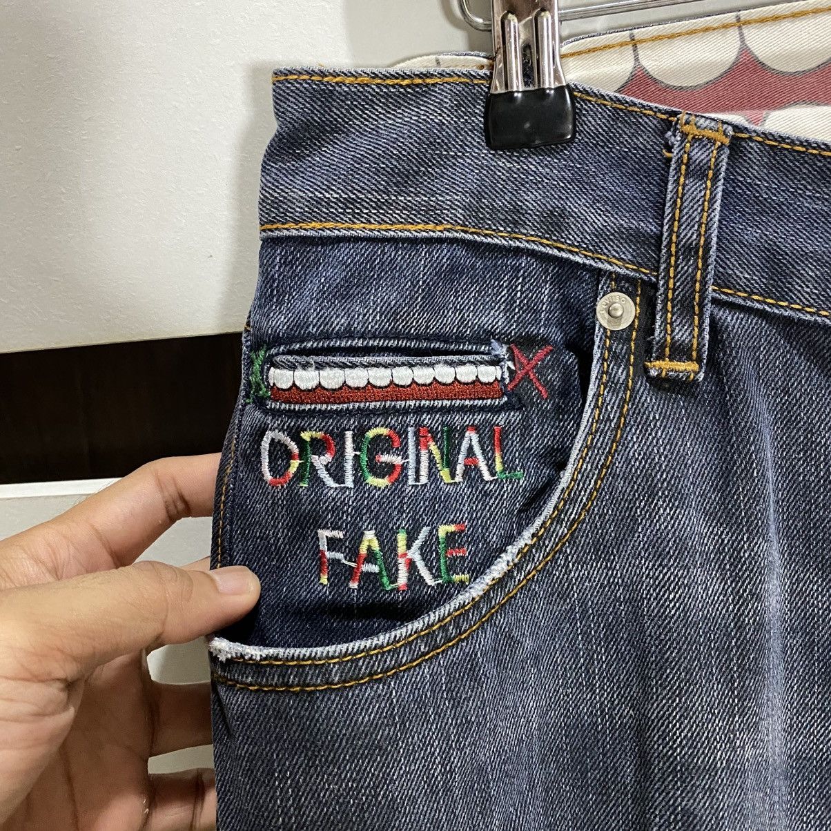 ARCHIVE LEVIS X KAWS X ORIGINALFAKE DENIM PANTS SIZE 30