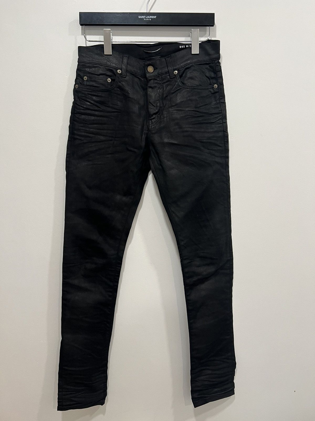 image of Saint Laurent Paris Nightrider Wax Denim in Black, Men's (Size 29)