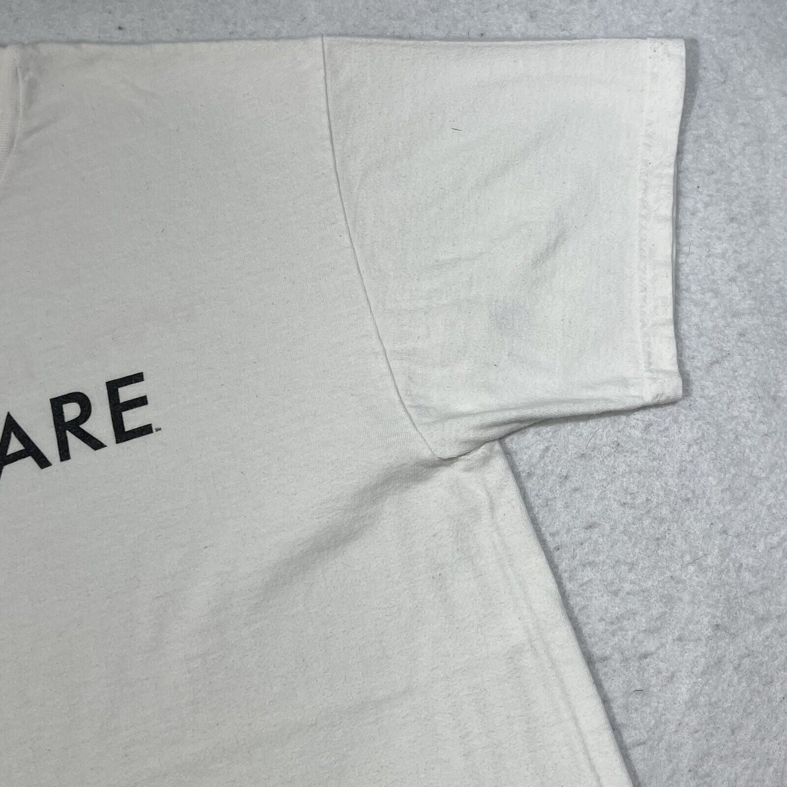 Hanes Vintage Linuxcare White Tee Graphic T Shirt Hanes Size US L / EU 52-54 / 3 - 4 Thumbnail