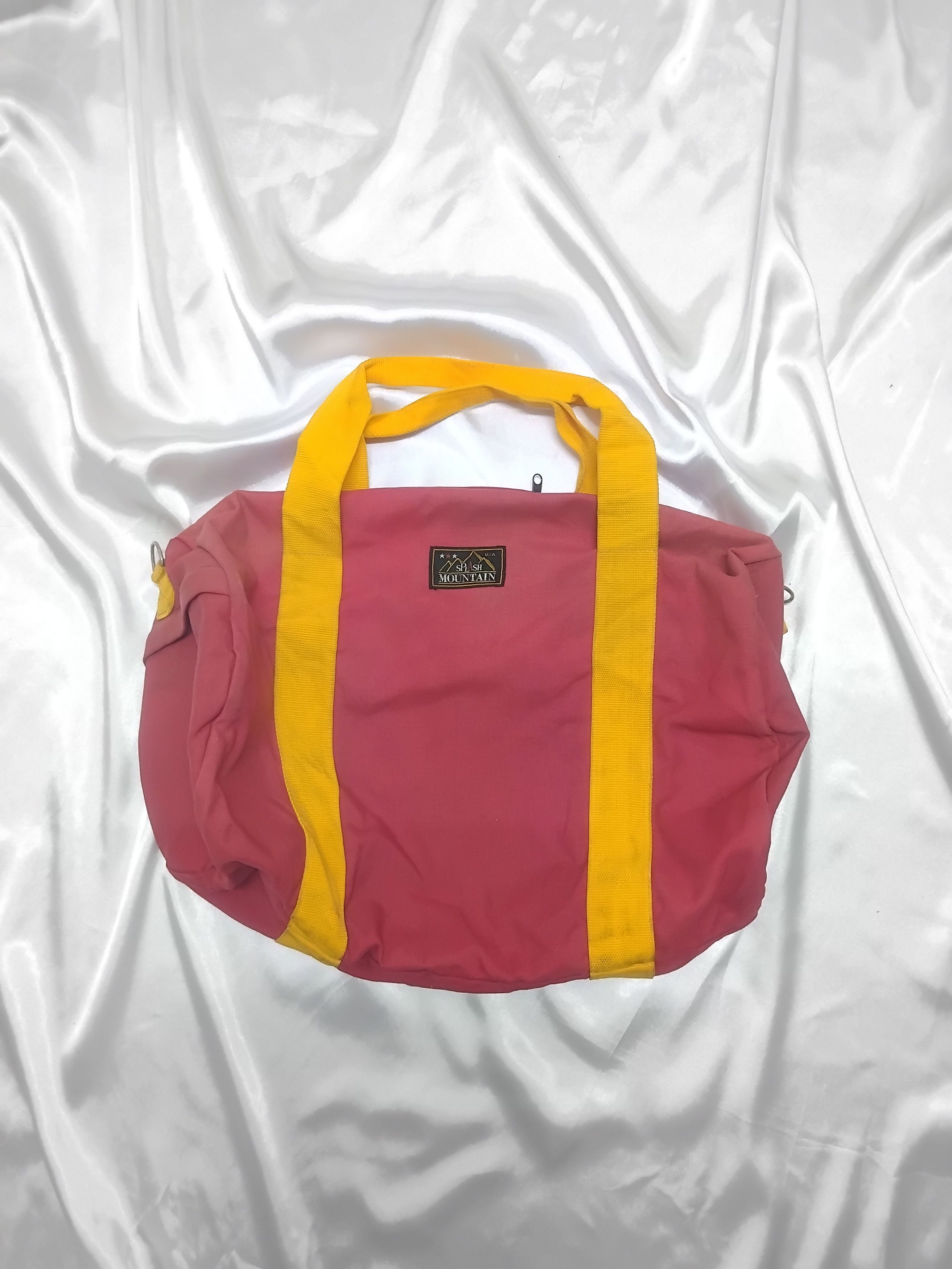 Splash mountain faded red bag