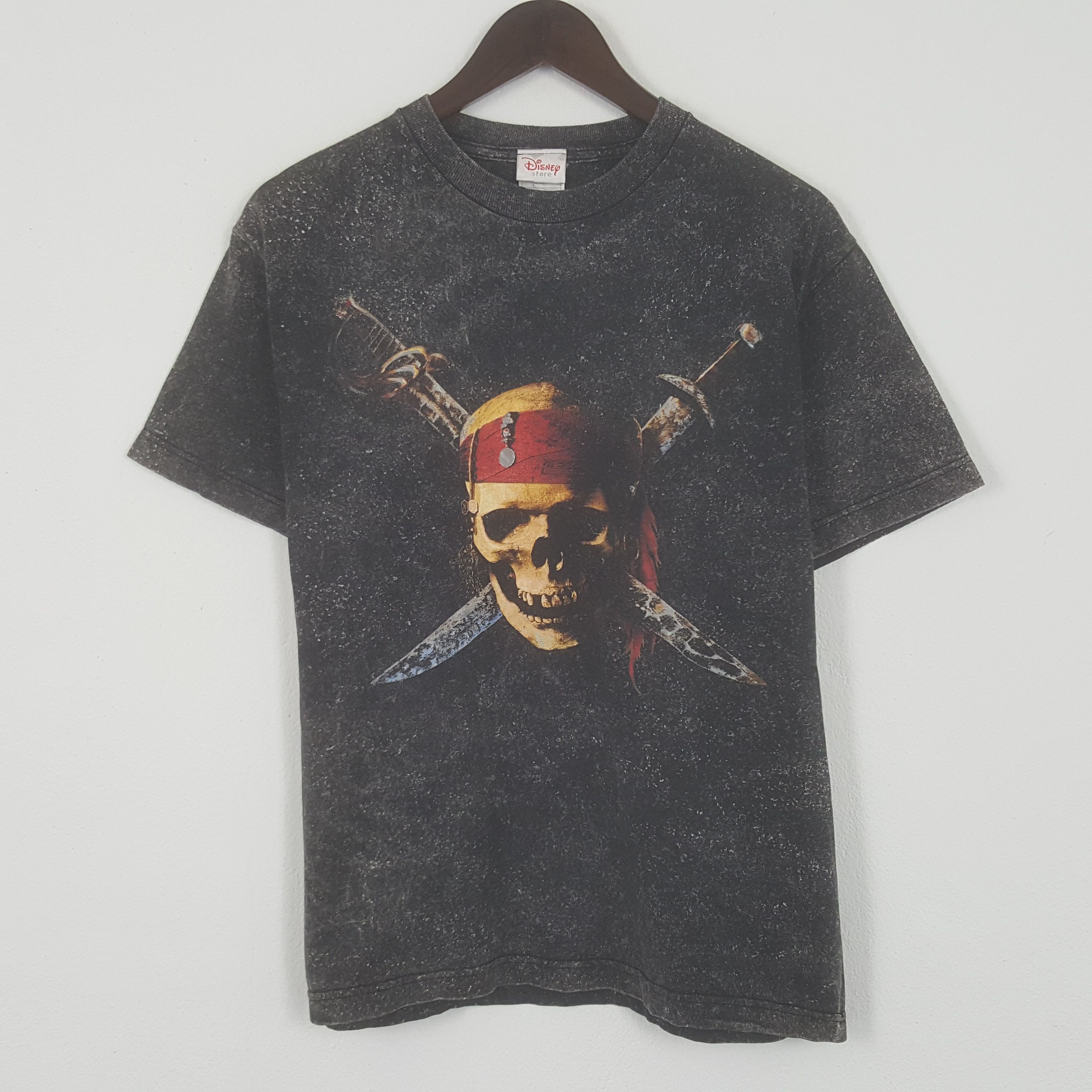 image of Disney x Movie Vintage Pirates Of The Caribbean American Movie Tshirt in Black, Men's (Size Medium)