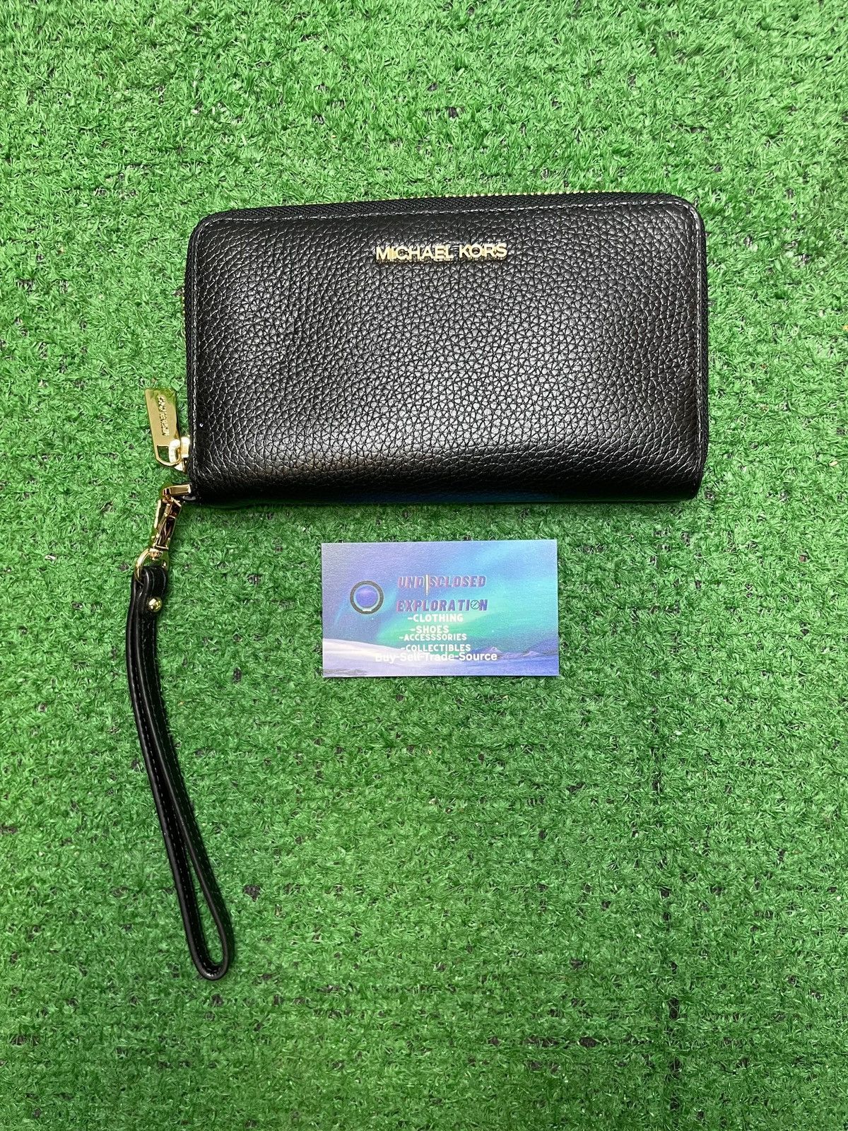 Michael Kors Michael Kors black pebbled leather wristlet Size ONE SIZE - 1 Thumbnail