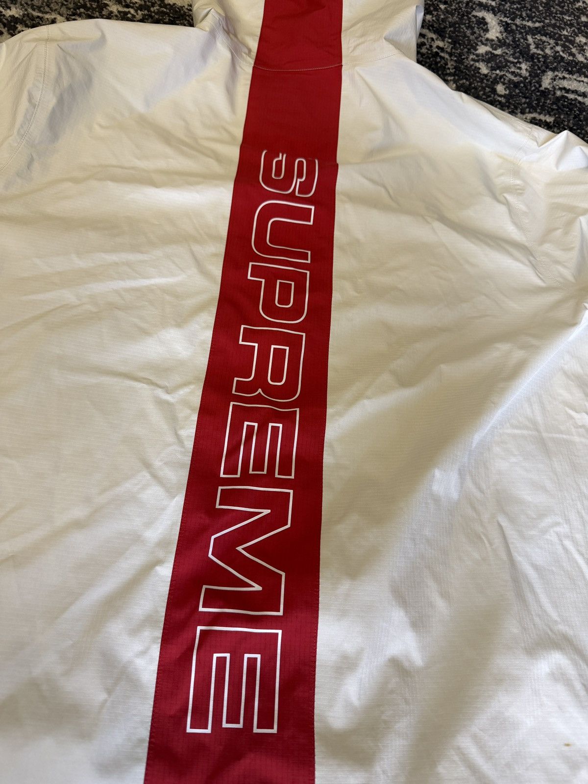 Supreme Supreme Pertex Shield+ Waterproof Hooded Jacket –White / Red Size US L / EU 52-54 / 3 - 1 Thumbnail