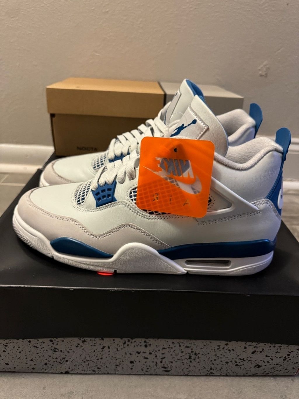 Jordan 4 orange and blue best sale