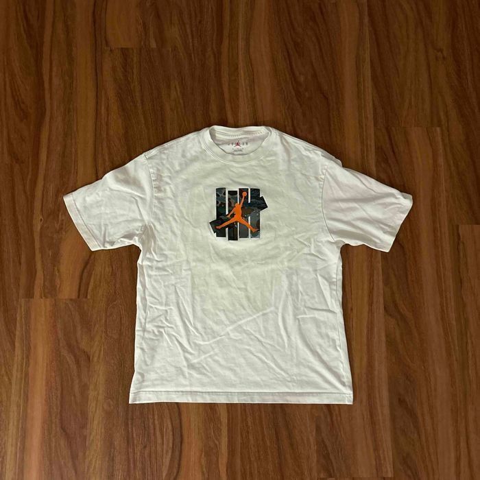 Jordan Brand × Undefeated Air Jordan x UNDEFEATED Strikes T-Shirt 'White' DX4304 100 Size US M / EU 48-50 / 2 - 3 Thumbnail