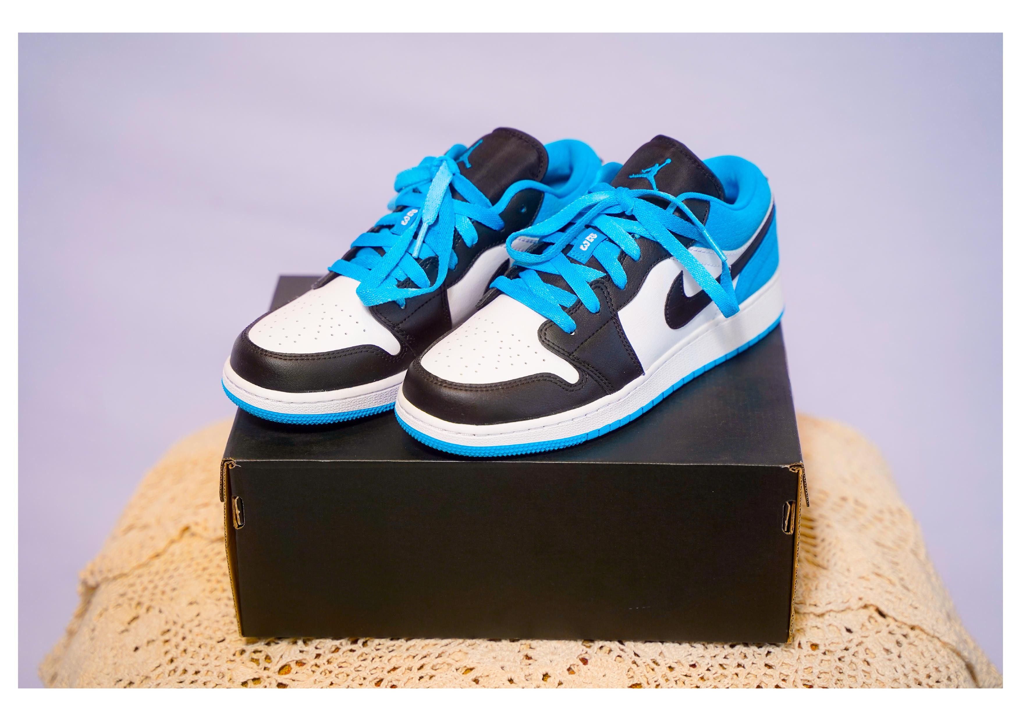 black and blue jordans low top