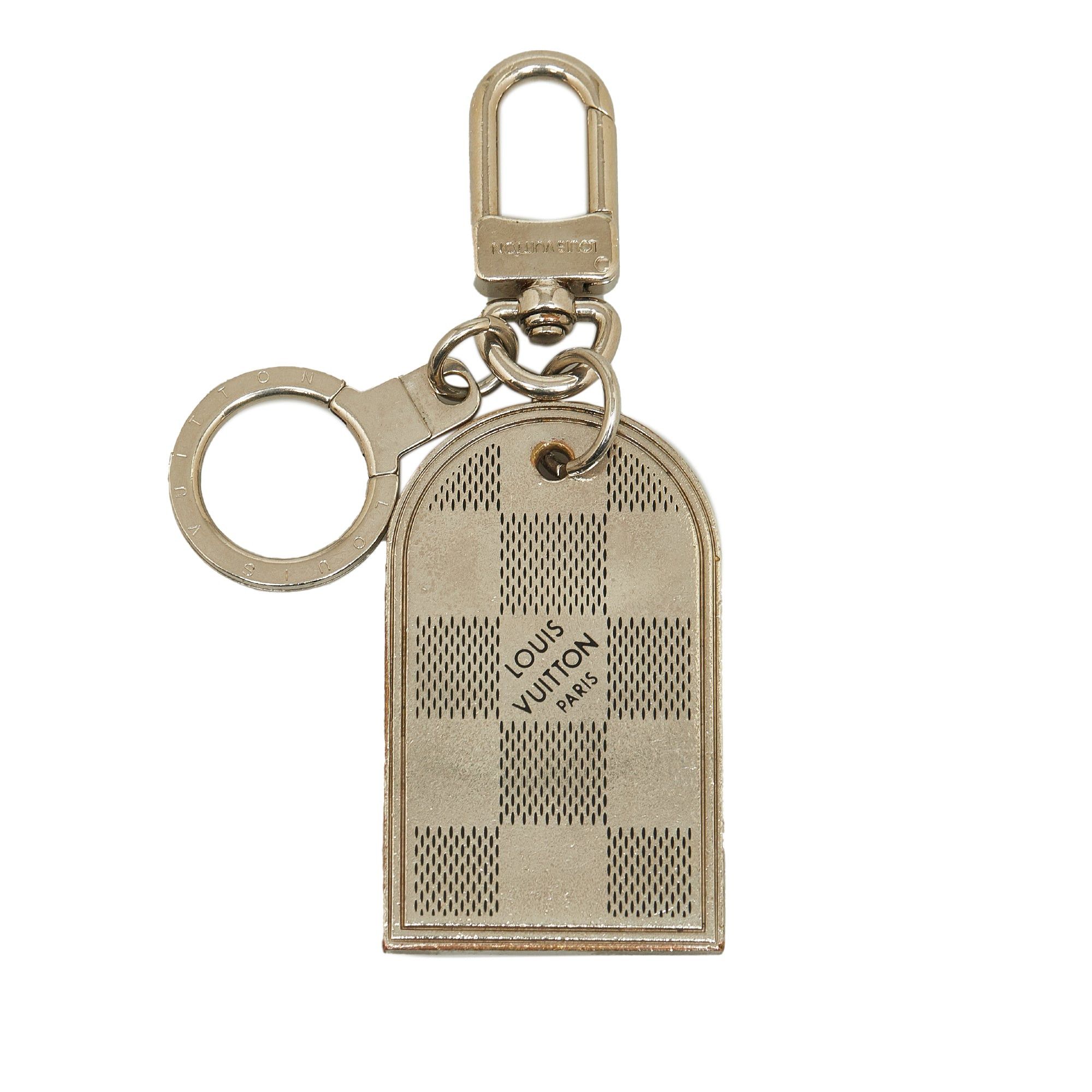 image of Louis Vuitton Metal Luggage Tag Bag Charm in Silver, Women's