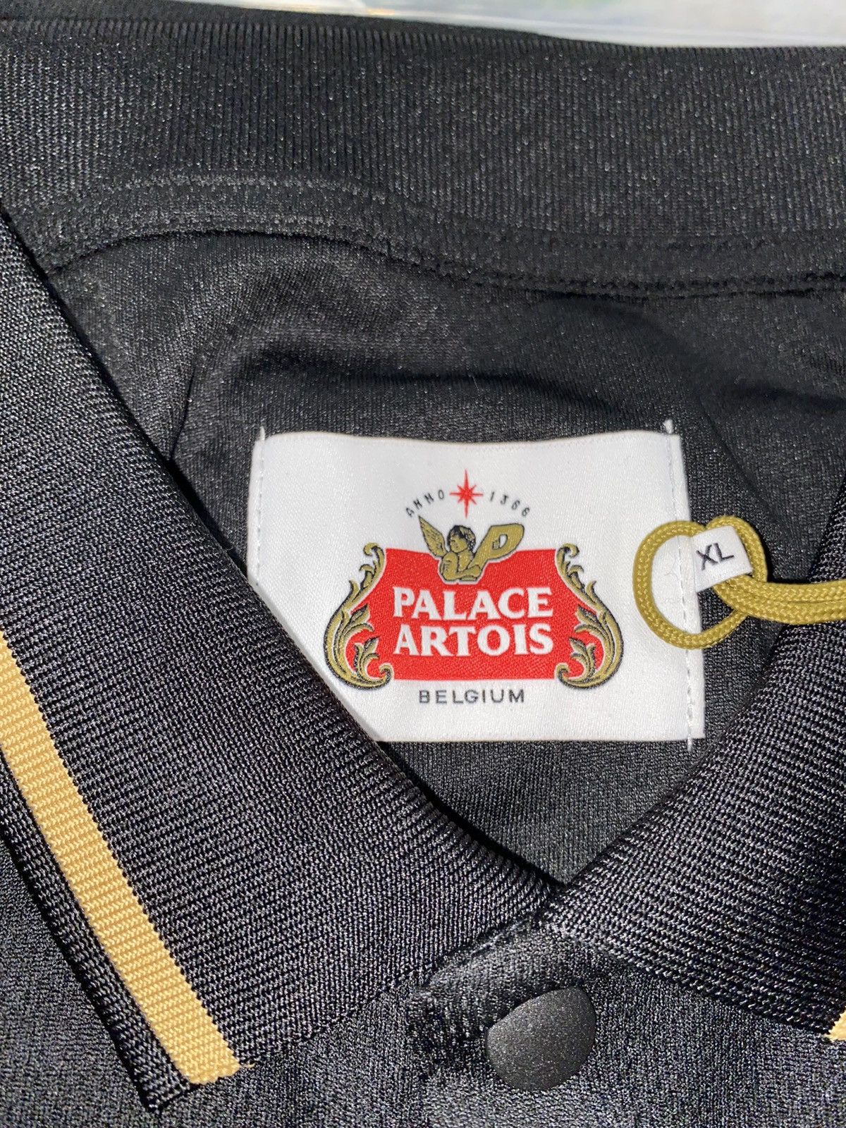 Palace Palace x Stella Artois Tech Polo Black | Grailed
