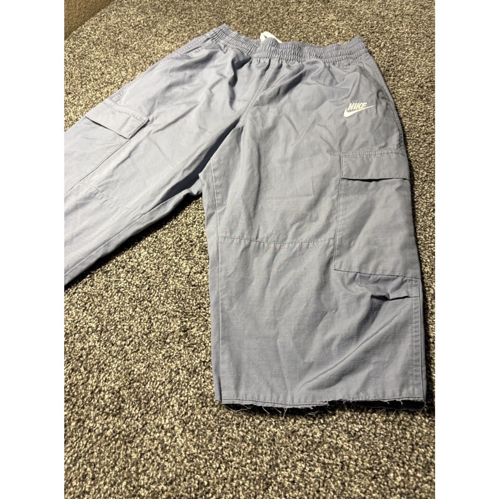 Nike Nike Pants Mens Small Blue Woven Cargo Ripstop Snap Pockets DX0613 Cutoff RW Hem Cargo Pocket Elastic Waist Pockets Mens Blue Nike Size US 29 - 2 Thumbnail